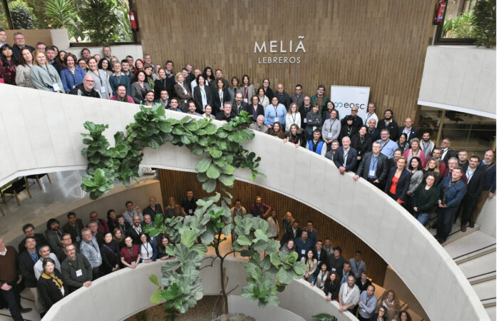 Group photo on stair of grand hall of all participant