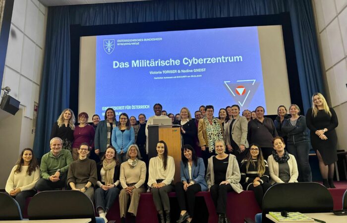 Group photo on stage of all shecurity participants